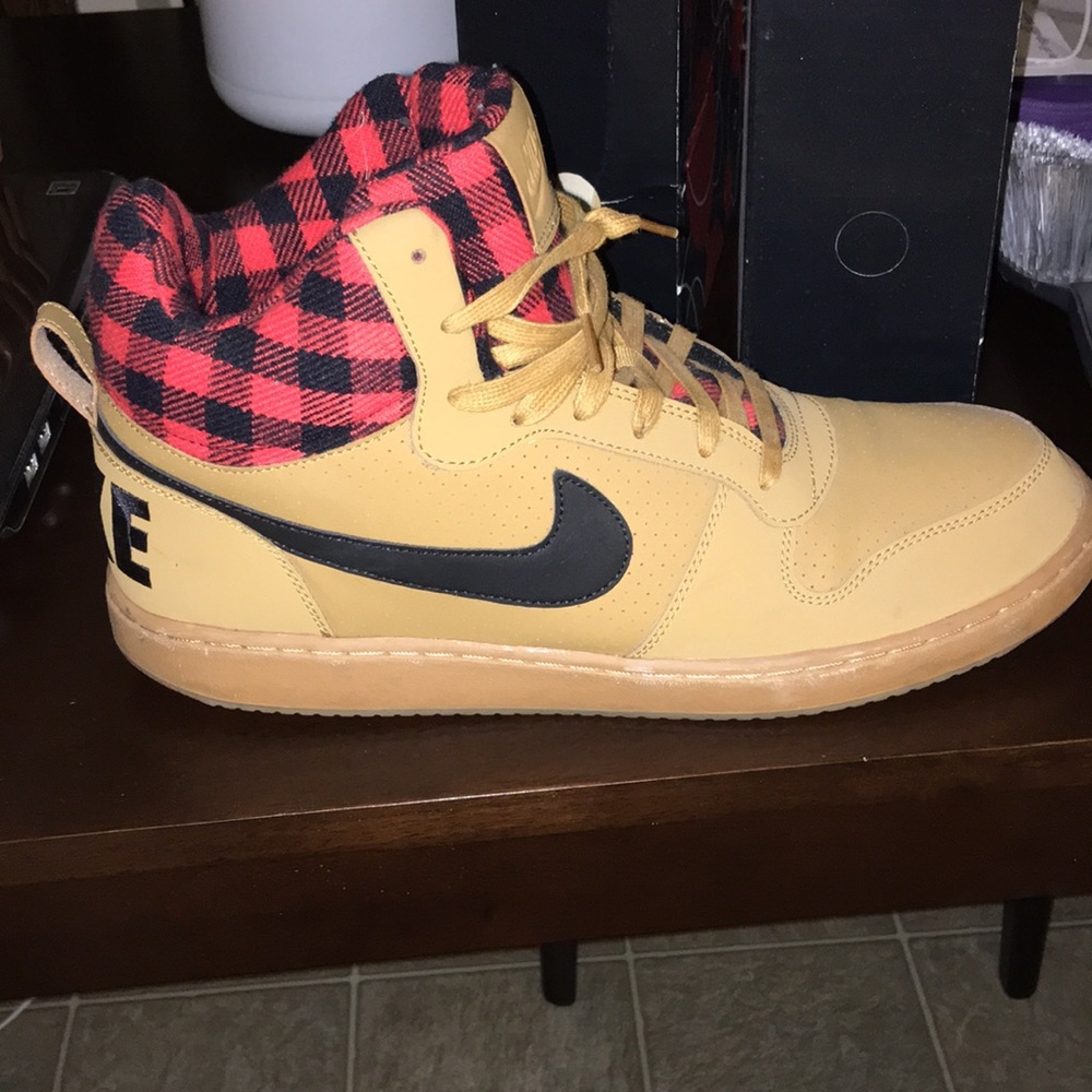 Nike 13, brown leather boots w/red/black pattern.